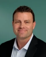 CHAYCE CLARK, Executive Vice President and General Counsel